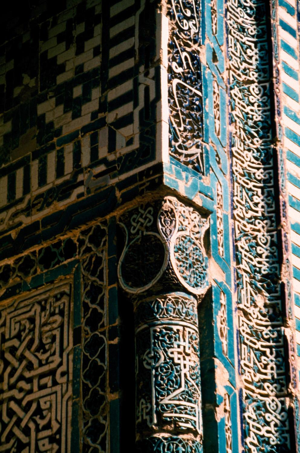 Khwaja Ahmed Mausoleum - Exterior detail of portal niche showing mosaic decoration of wall and embedded column