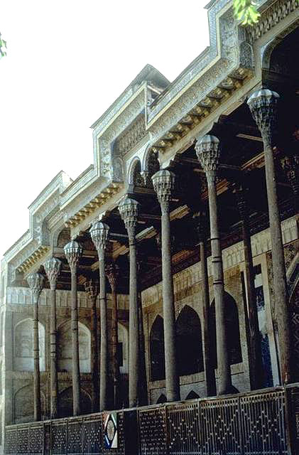Exterior view of portico and columns with ornamental capitals