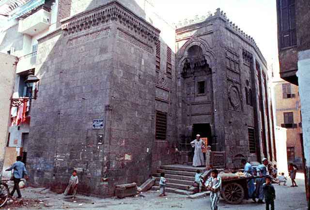 Exterior view showing the base of minaret and the entrance