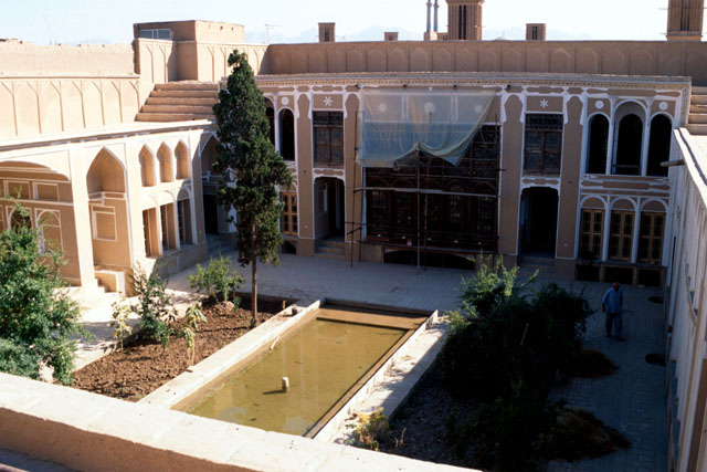 View into a courtyard with its central pool