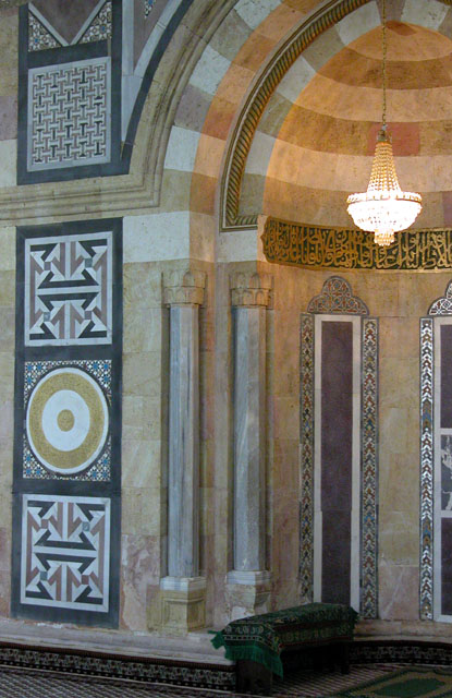 Detail view of the mihrab niche and the side decorative mosaics