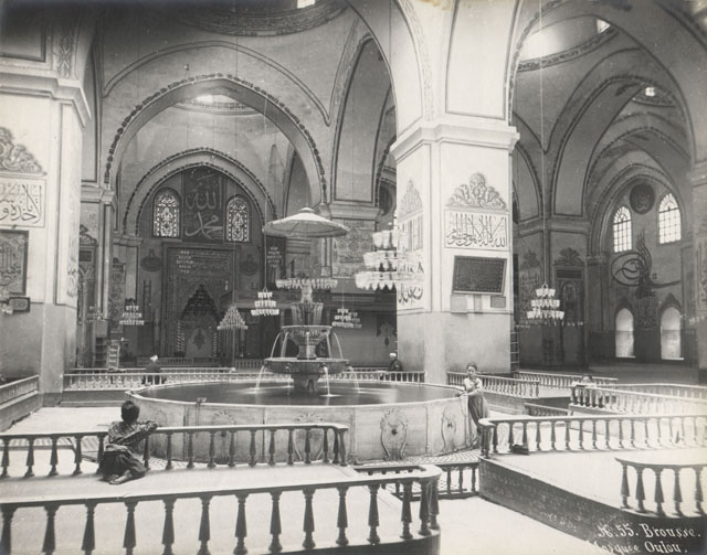 Interior view looking south towards the mihrab, with the ablution fountain in the foreground