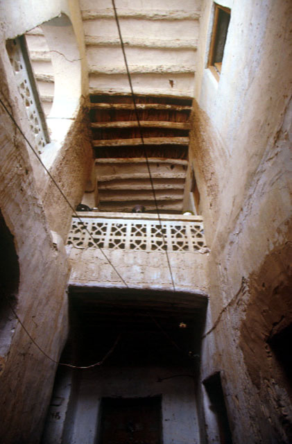 Detail, second floor balcony and plastered beam roof
