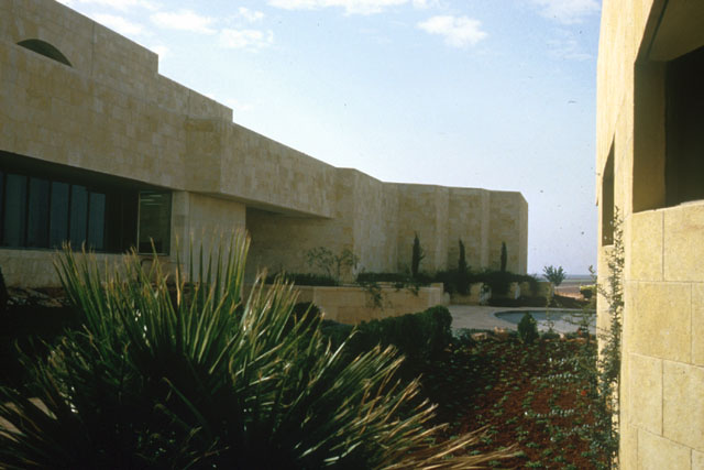 Exterior view between buildings showing landscaping