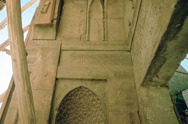 Detail of main portal,  section of foundation inscription and niche