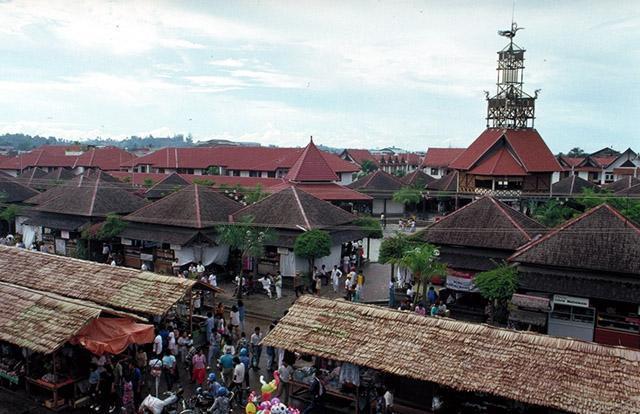 Aerial view showing the street hawkers' stalls with the shop-houses in the background