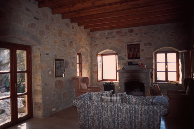 Interior view showing wood and stone living room