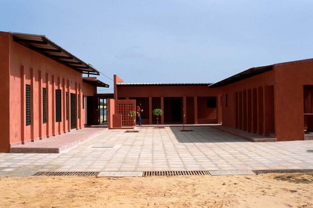 Courtyard view, looking north at the three wings containing the hall (left), restaurant and kitchen (center), and handicraft-room and dyeing atelier (right)