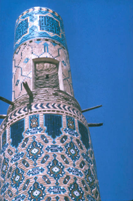 Detail of north minaret; top section with balcony door and tile inscriptions