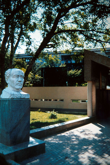 Exterior view to entrance showing monumental sculpture