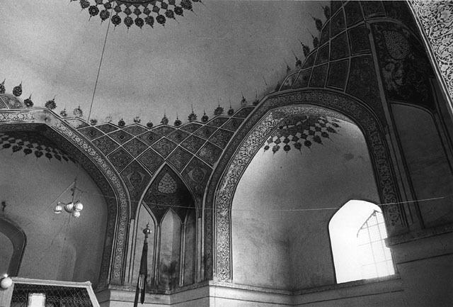 Interior view looking up at dome and transition zone of squinch-net vaulting, with painted decoration
