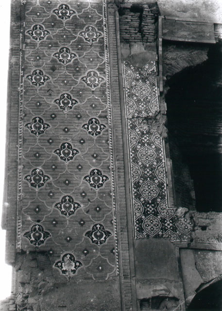 Detail of southern iwan; Safavid brickwork with tile mosaics on left inner wall and arch