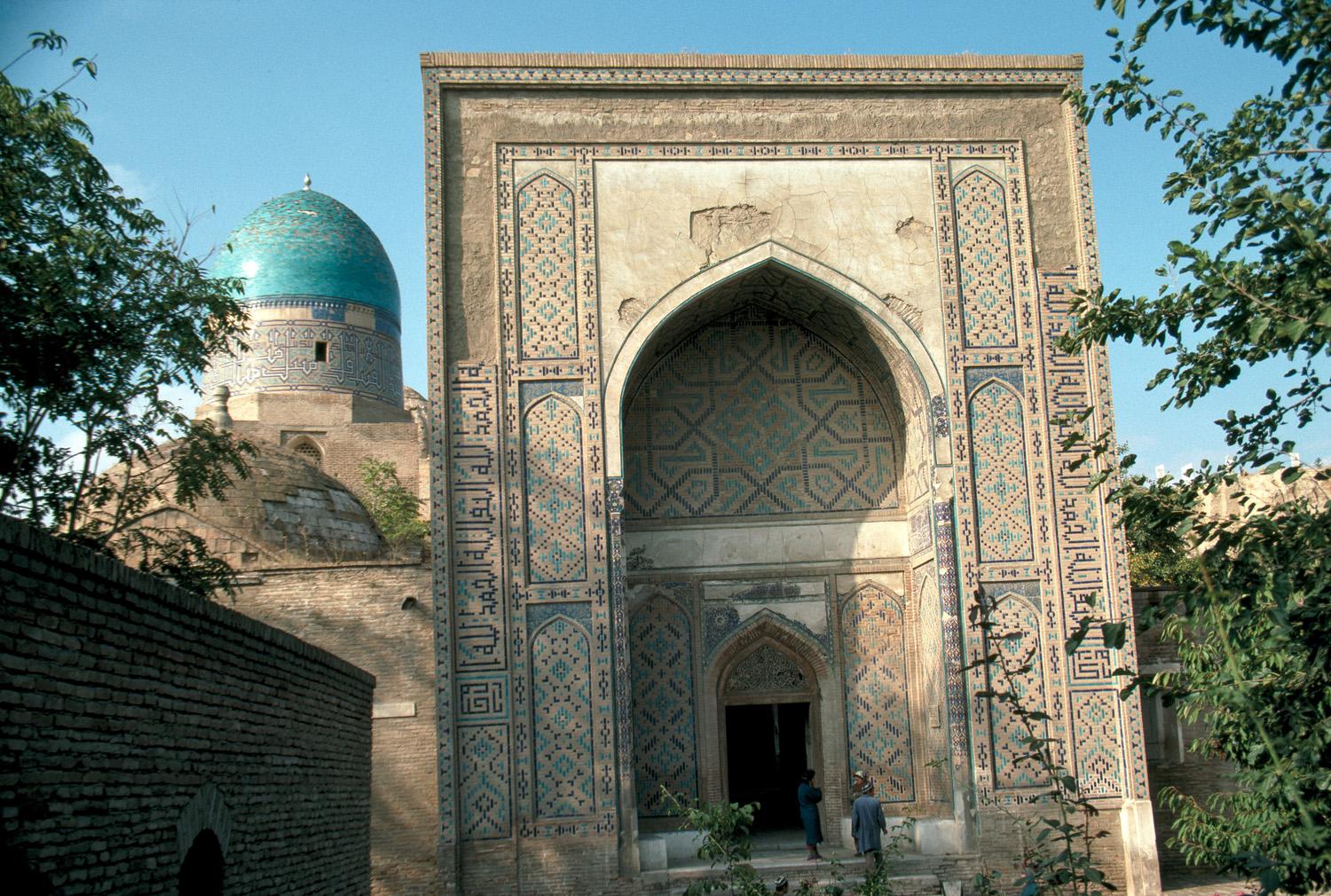 View from the south. Beyond the monumental pishtaq rises the dome of  the anonymous mausoleum III ("Qazizadeh Rumi")