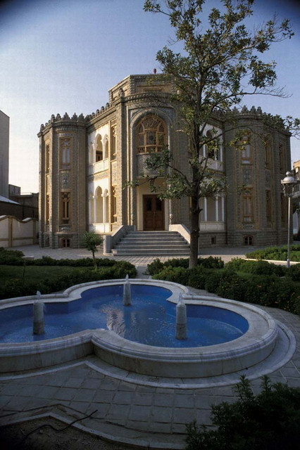 Exterior view, with ornamental pool