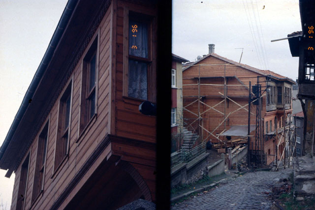 Exterior view showing wooden façades being restored