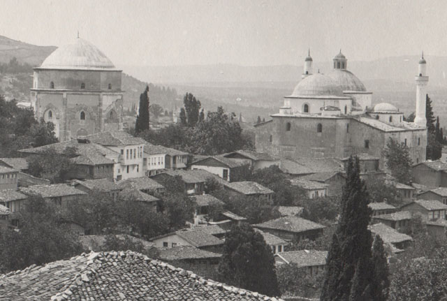 Detail from photograph of complex in urban context in the second half of the 19th century, showing the mosque and tomb stripped of tiles and stone panels during renovation