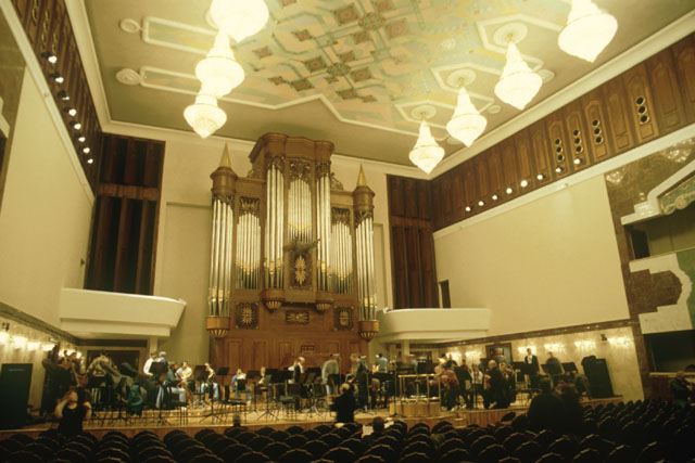 Interior view of performance hall showing full organ
