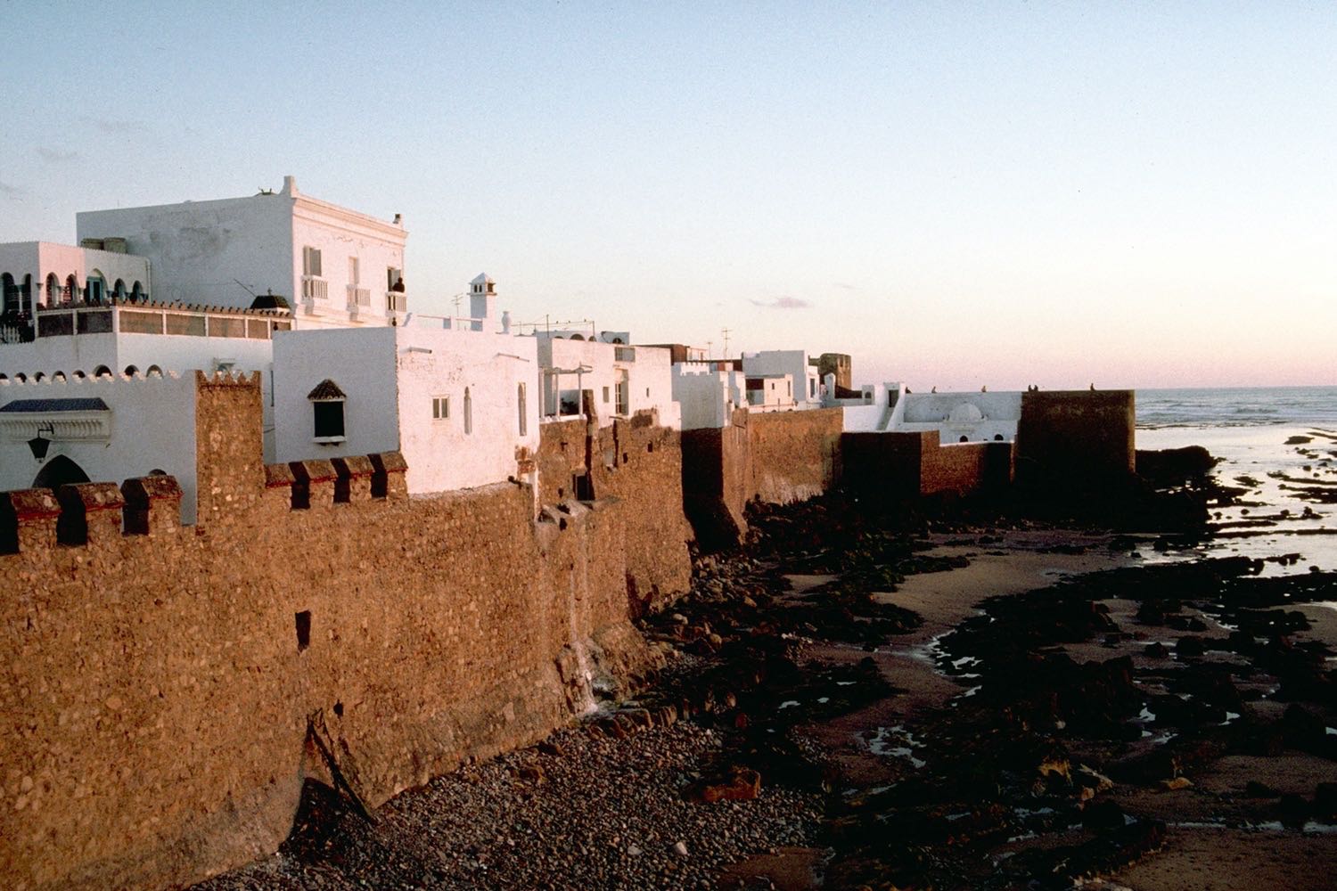 Masonry lookouts punctuate the sea-wall overlooking the Atlantic Ocean