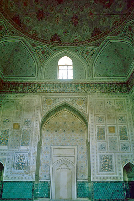 Interior view of Gok Gunbad after restoration, showing qibla wall