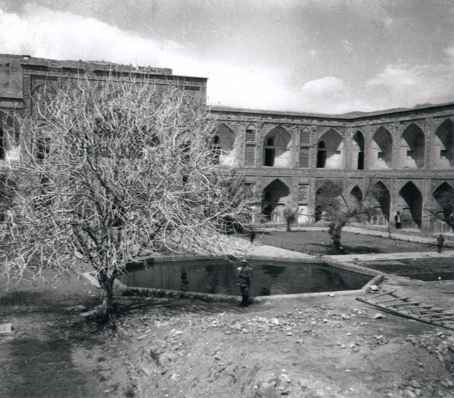 Exterior view, courtyard with central pool and arcades