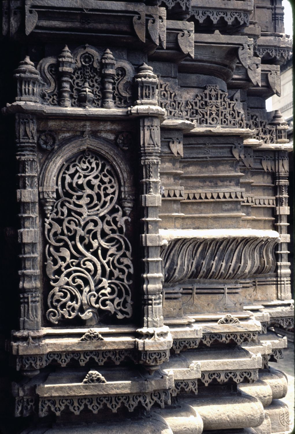 Detail view of minaret showing carved ornament.