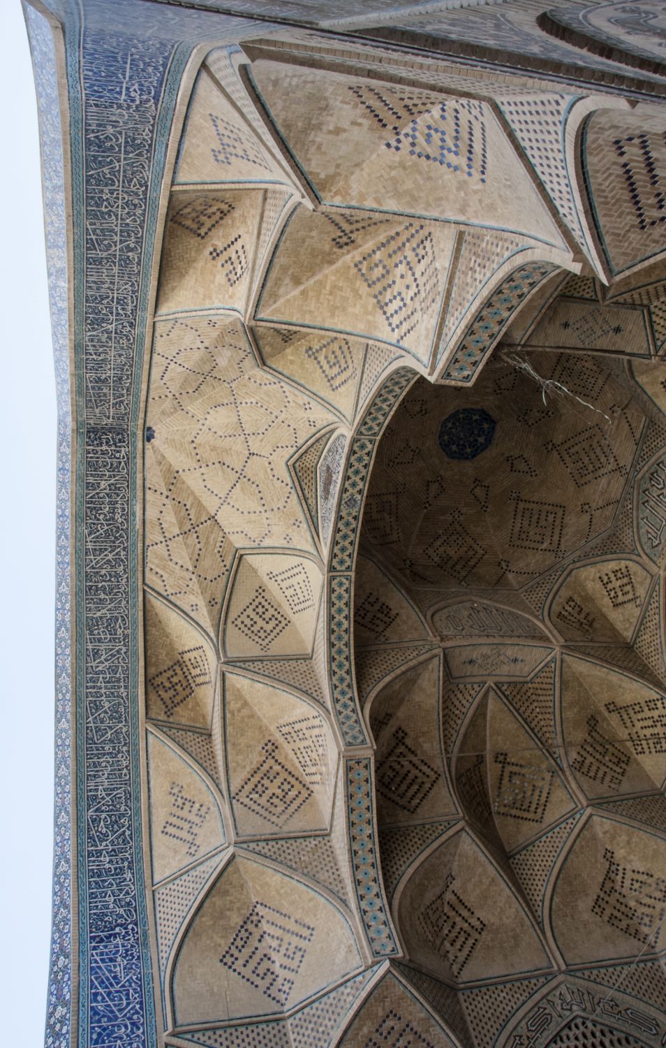 Southwest iwan, view of arch soffit and muqarnas vault from below.
