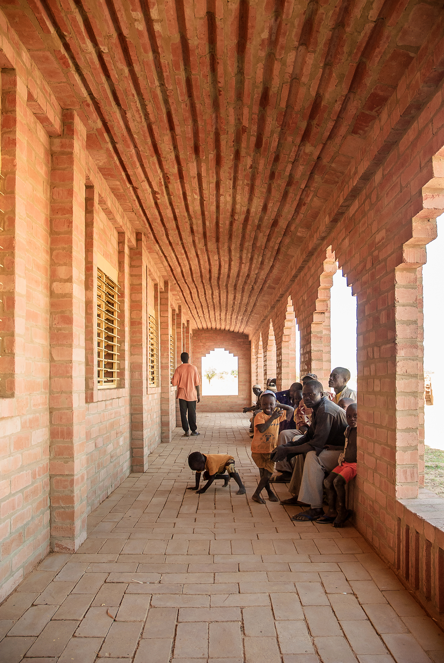 The verandas with their intricate floor pattern and benches establish a meaningful place for the elders of the village community  