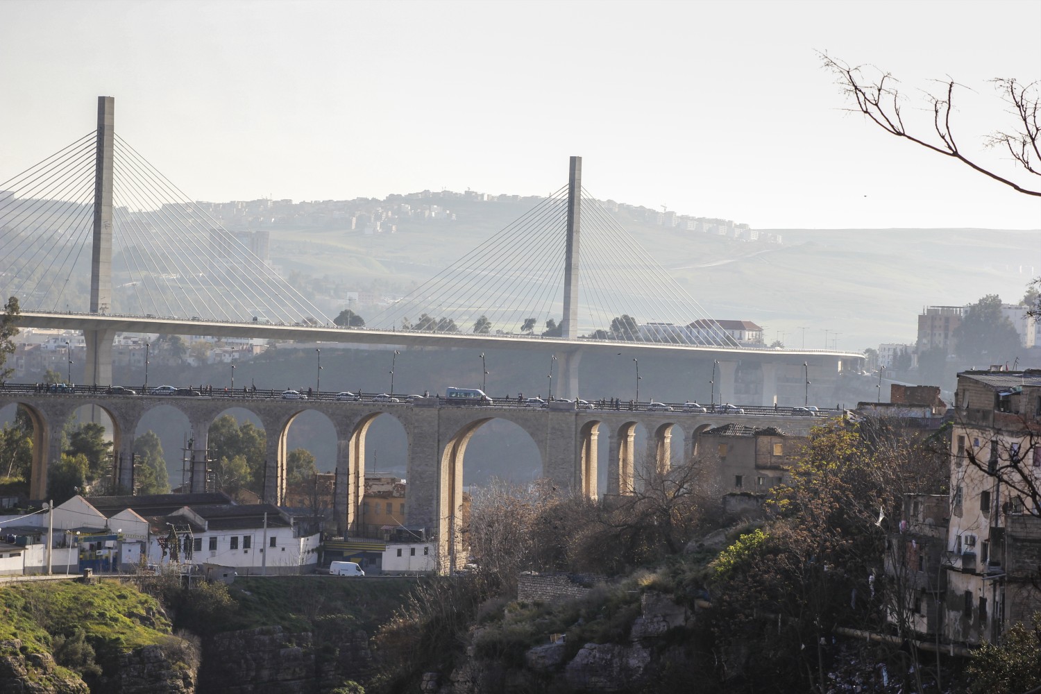 View of the stone bridge from west, with the Pont Géant Salah Bey visible in the background