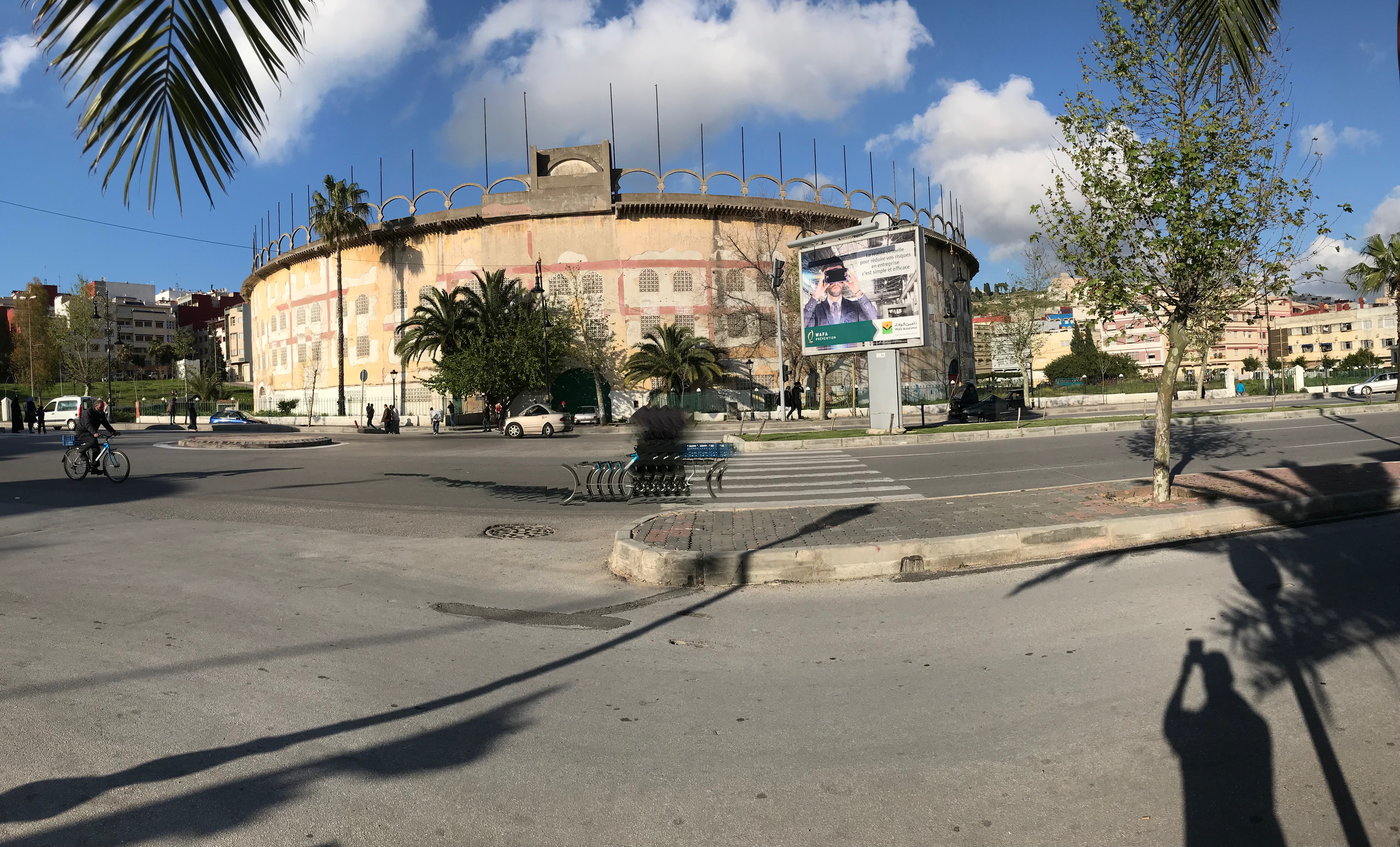 <p>In situ view from across Rte de Tetouan with cyclist and billboard</p>