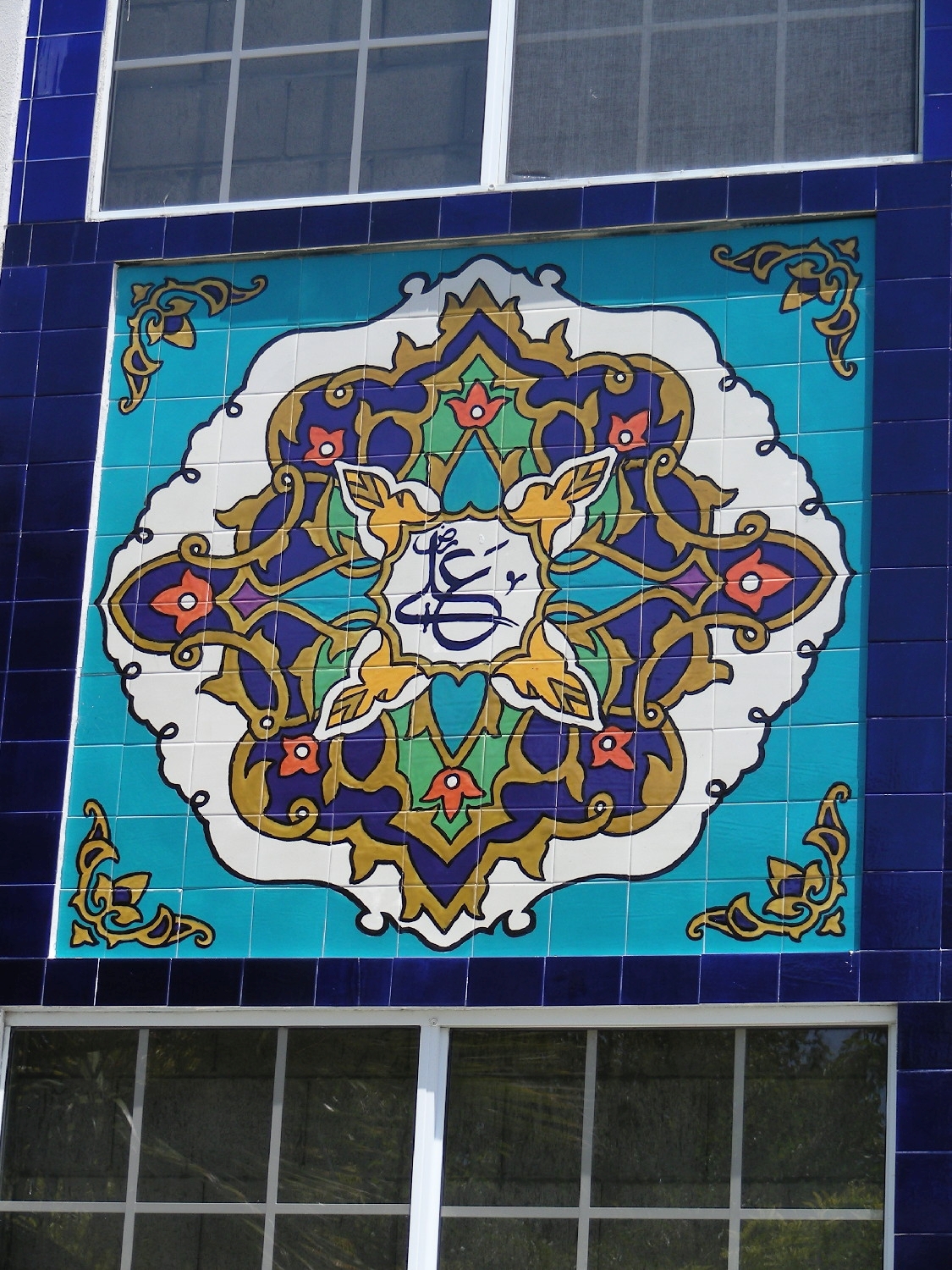 Exterior, detail of facade mosaic