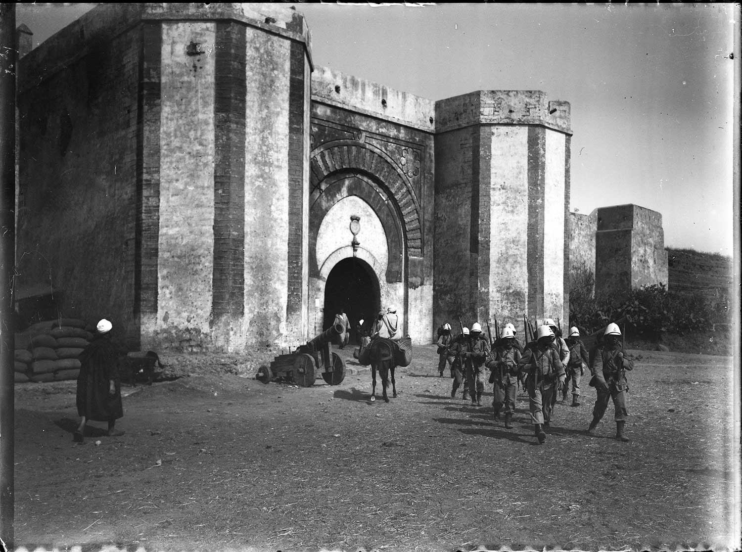 Exterior view, European soldiers coming our of Bab al-Had