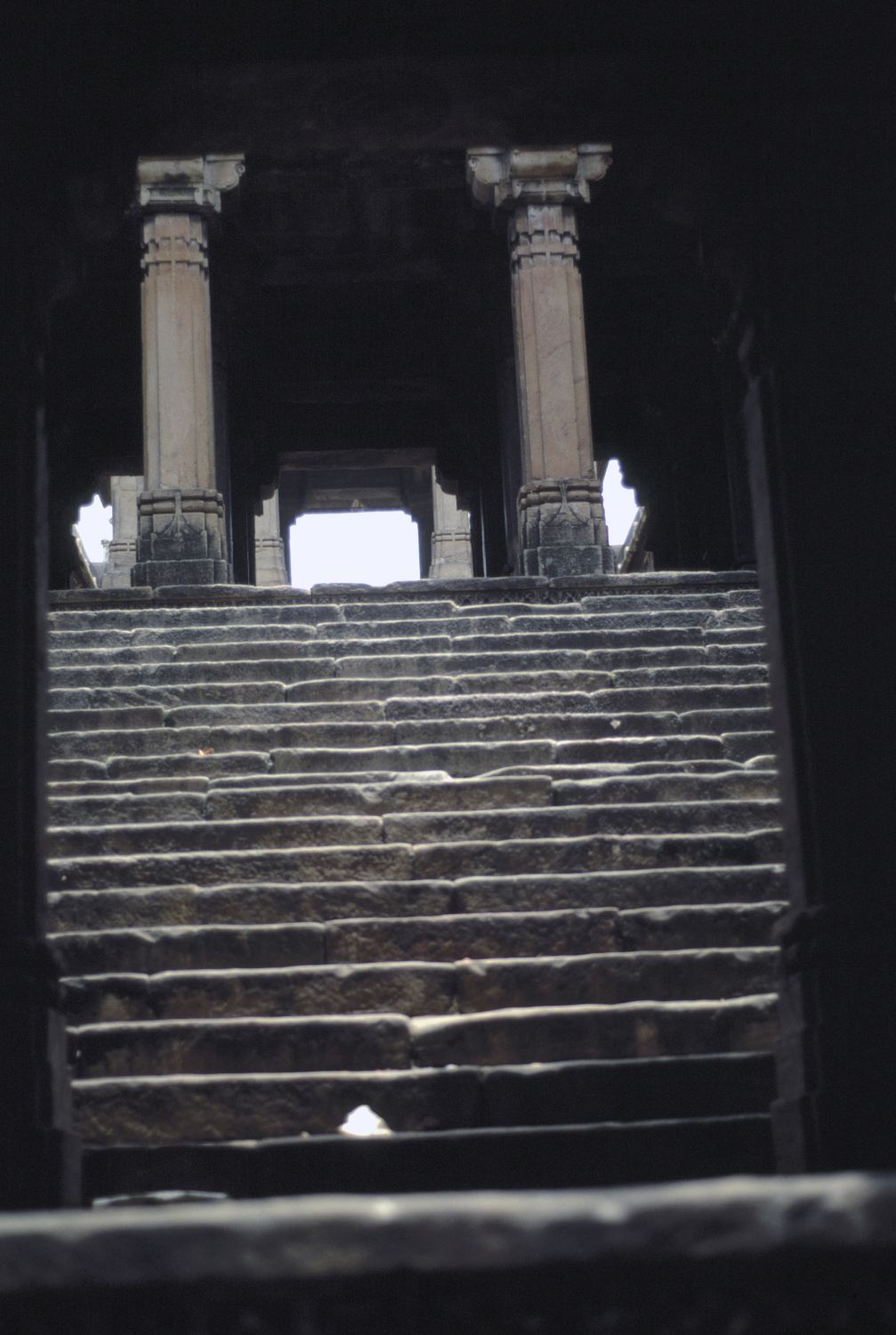 View up staircase toward entrance.
