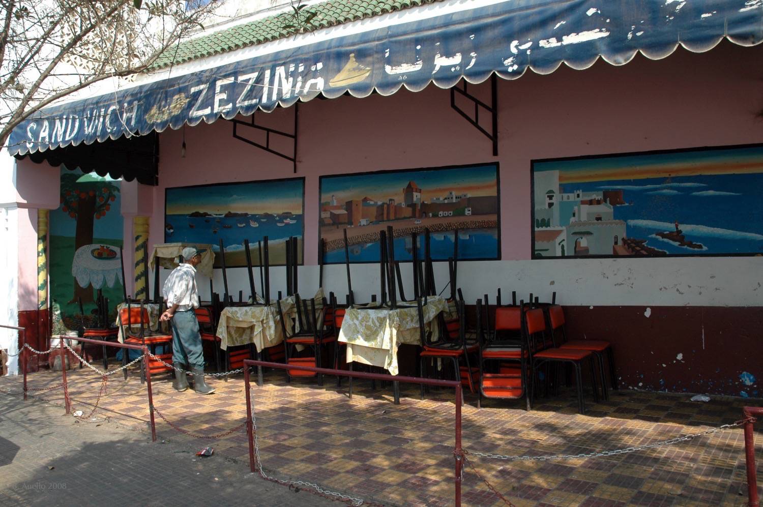 Murals of Asilah painted on the side of Zezinia café