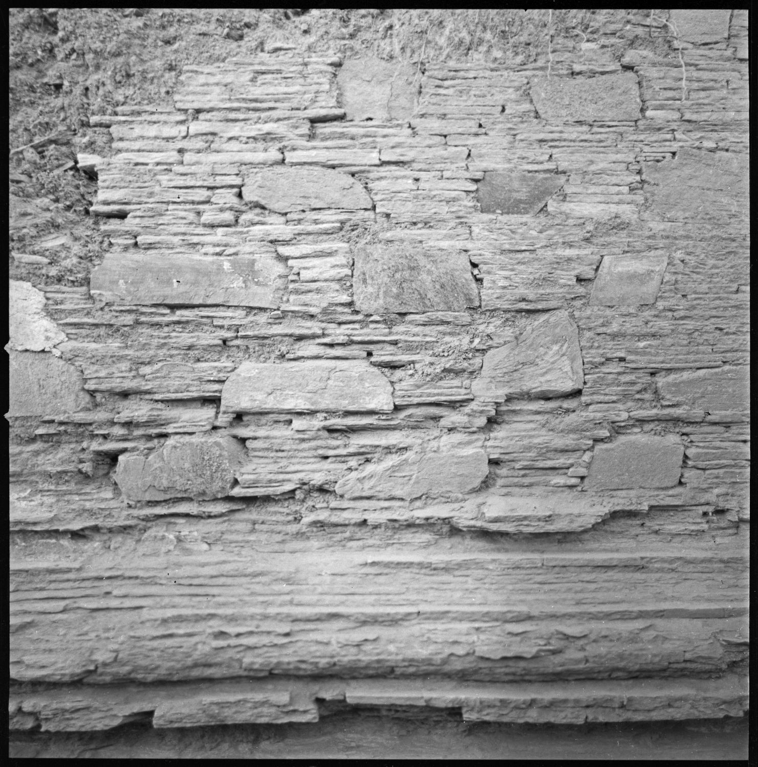 Stupa: detail of wall showing schist slabs.