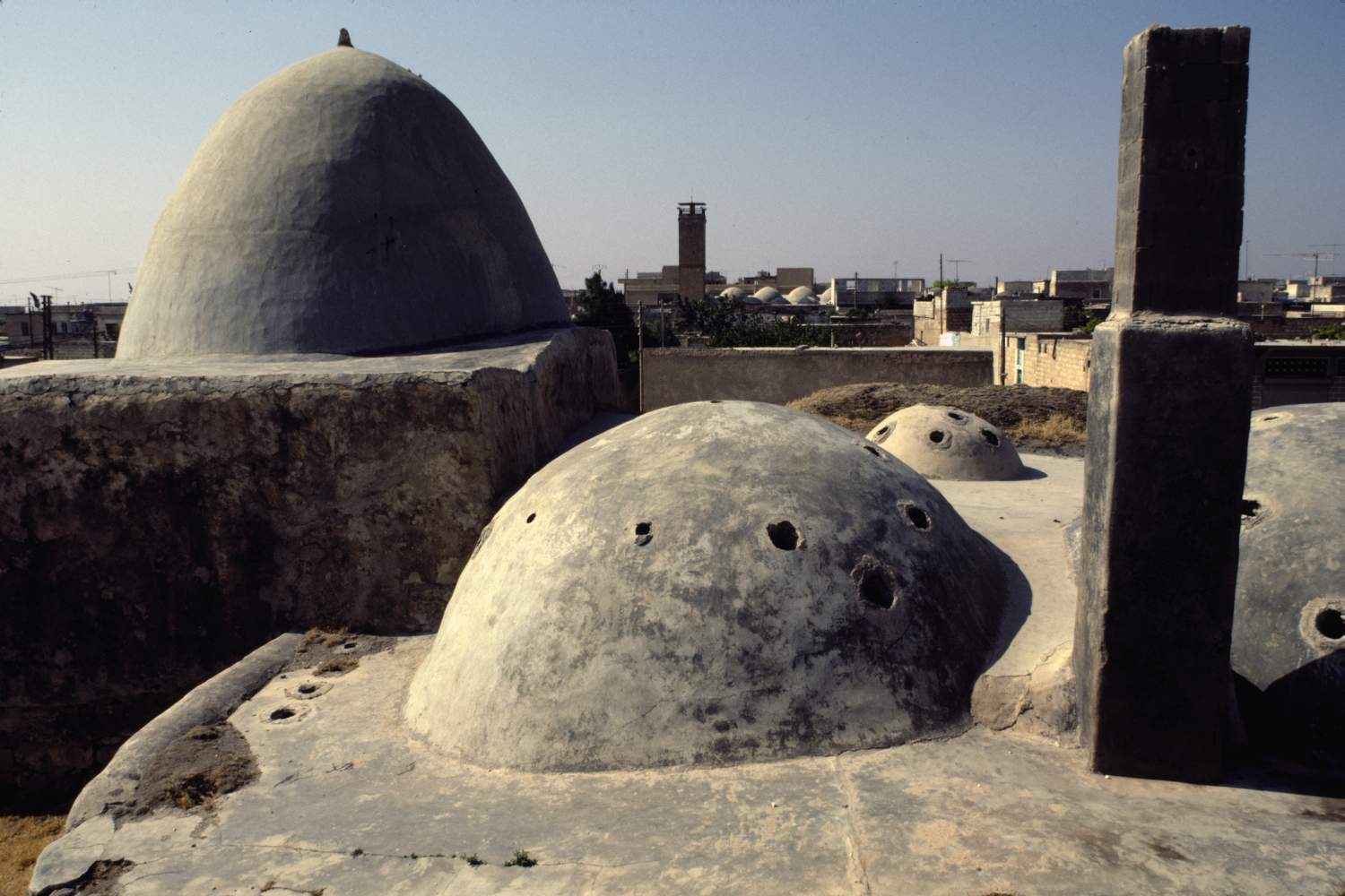 View of domes. Minaret of Great Mosque visible in background.