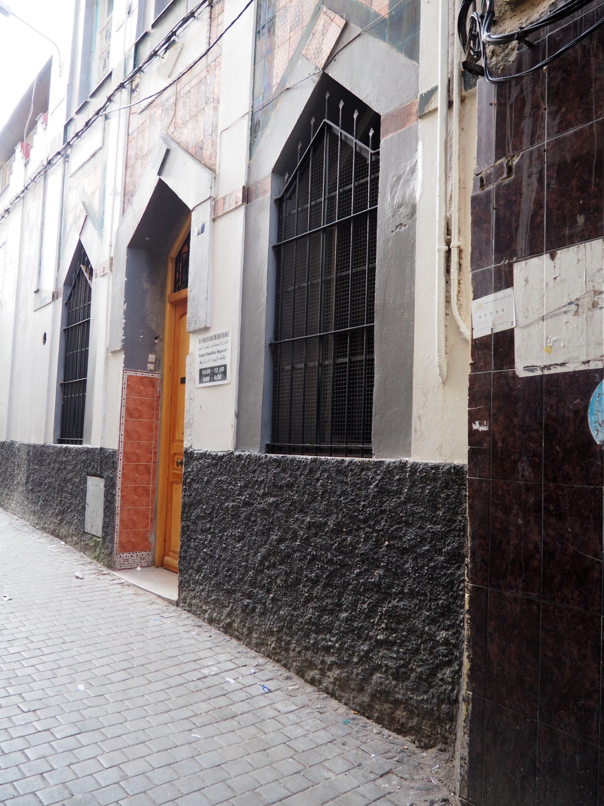 <p>View of the triangular doors and windows along rue de Postes </p>