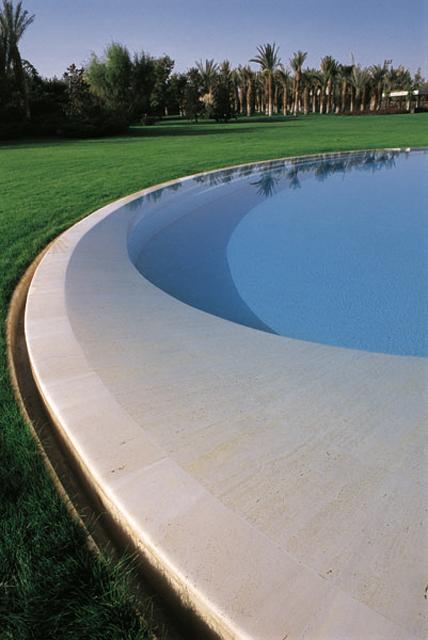 Hand carved travertine pool edge