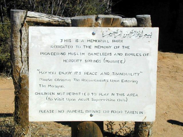 Sign outside of mosque says: "This is a memorial park dedicated to the memory of the pioneering cameleers and families of Hergott Springs (Marree)."