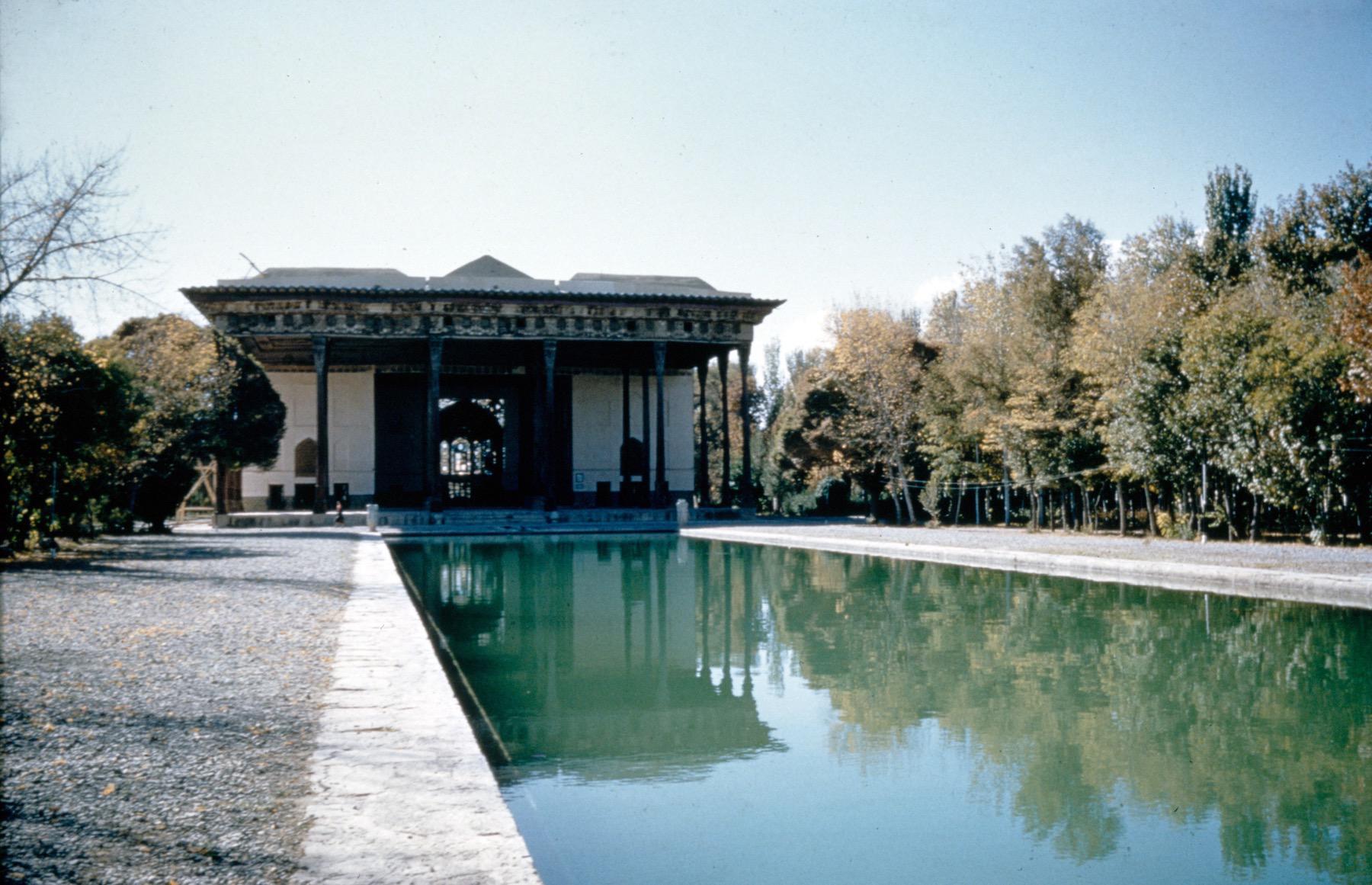 General view from east showing east facade, pool, and talar porch.