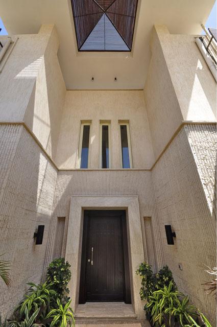 View of the main entrance facade, evoking the force of gravity, permanence, power and stability of Egyptian architecture
