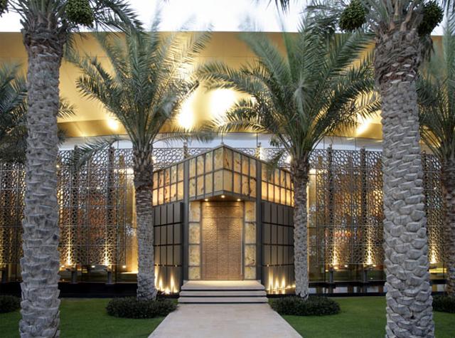 Helal 5: the main entrance is approached by date palm grove aisles