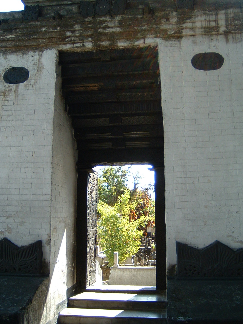 Detail view of entryway to cemetery