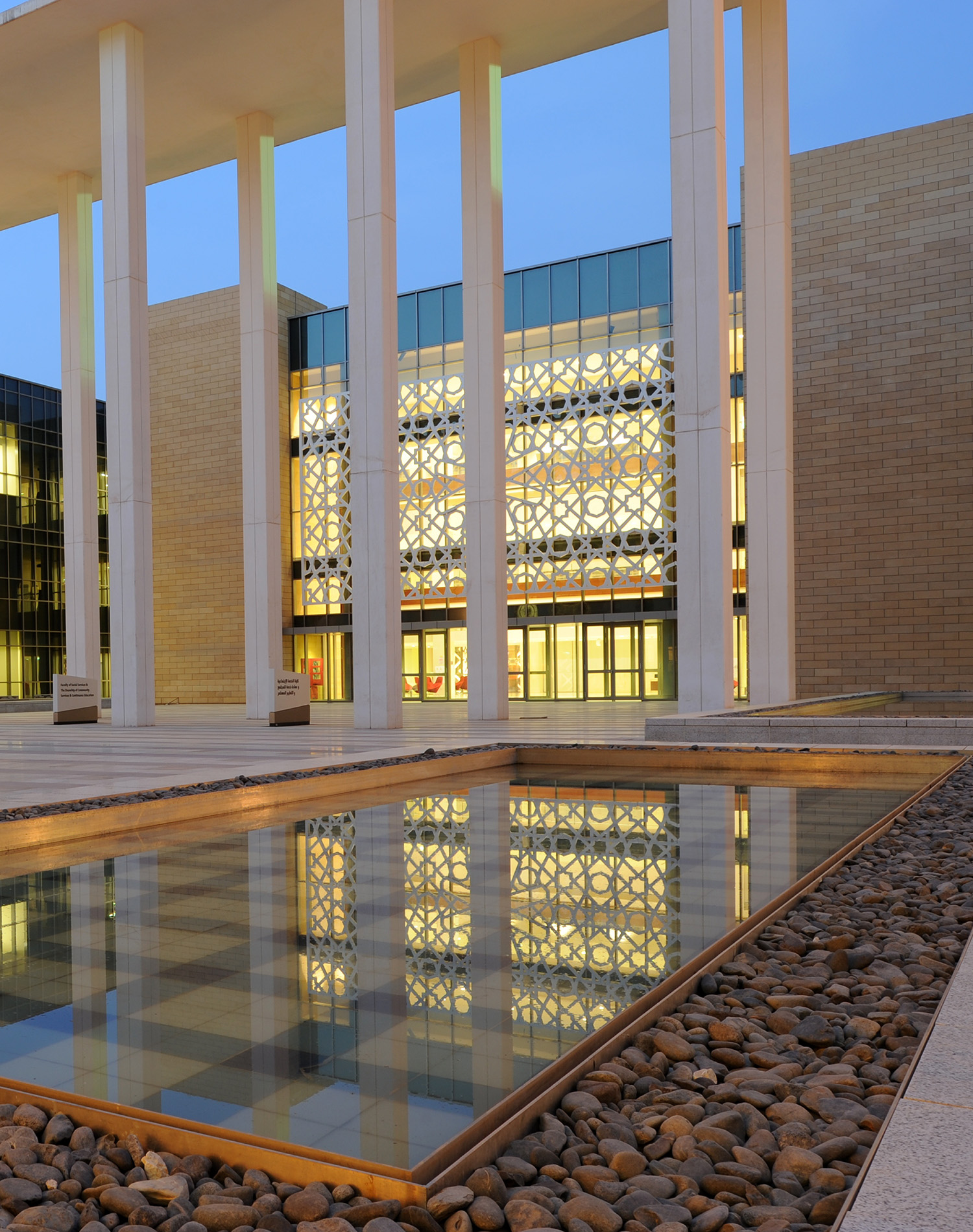 Entrance courtyard to the College of Arts and Sciences through the main pedestrian campus mall reflecting pools 