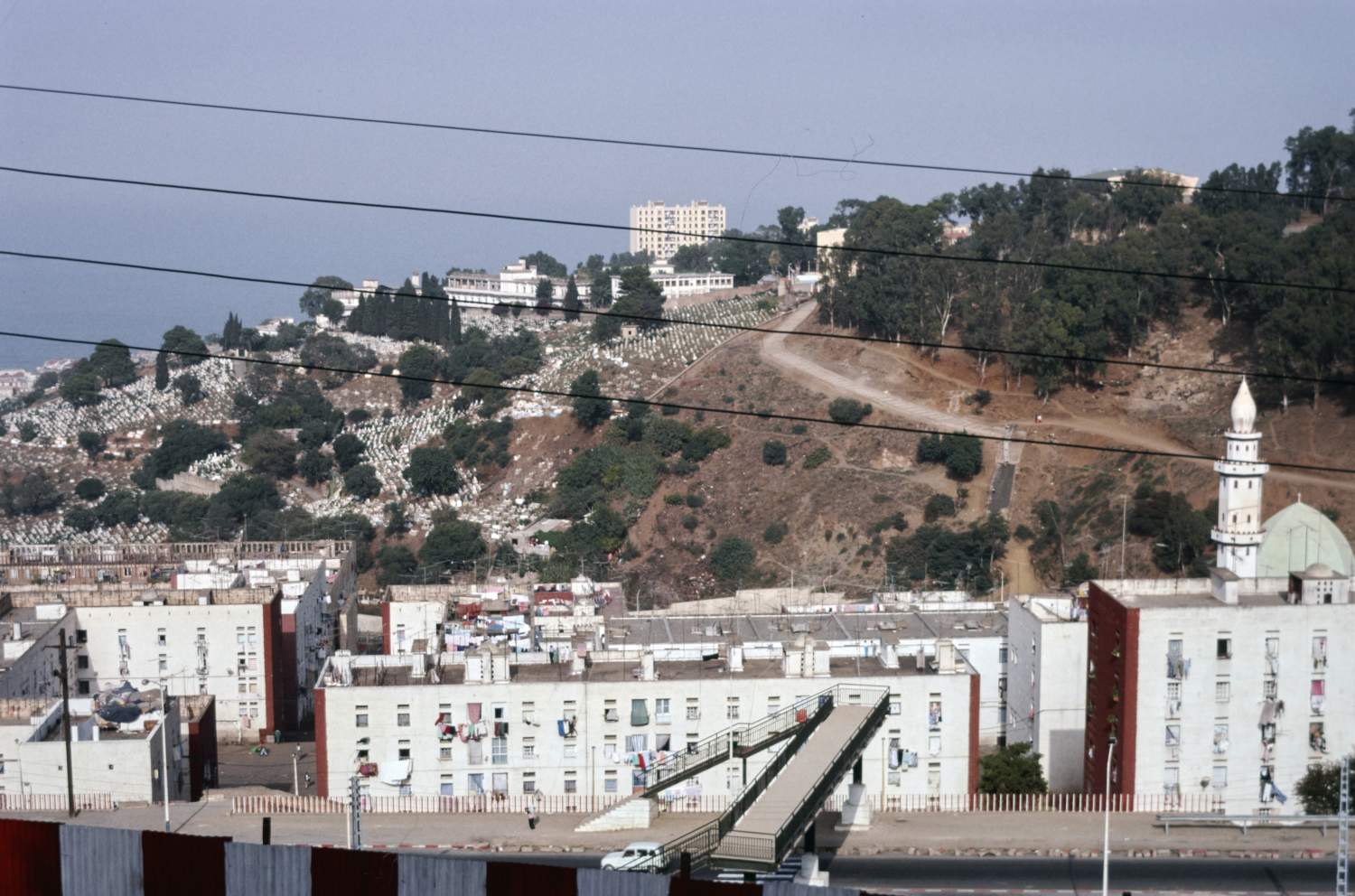 View of hill and buildings from above