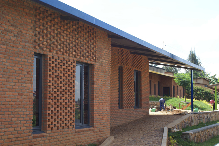 Holes in the walls, created by the areas of brick patterning, increase the ventilation of the classrooms