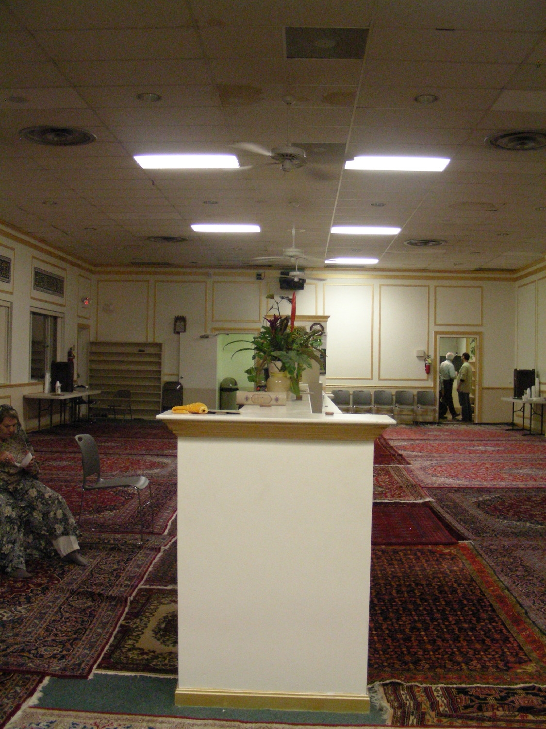 Prayer hall, looking away from qibla wall, showing divider between men's and women's sections
