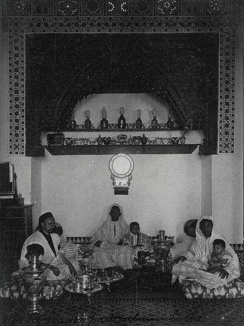 Interior view of living room of private household, serving tea / "Fez, Intérieur Marocain, Le Thé"