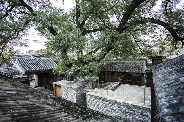 Once a typical “Da-Za-Yuan”-big messy courtyard- the architects redesigned, renovated and reused the informal add-on structures instead of eliminating them like most recent renovation practices

