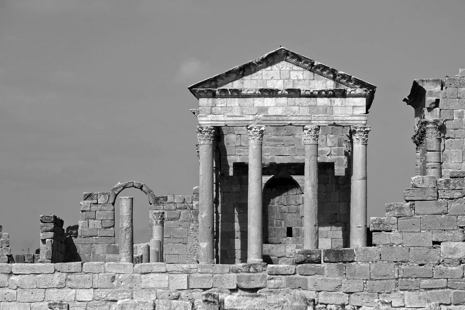 Facade and entrance of the Temple of Juno and the Capitol podium area of Sbeitla. View from the southeast. 