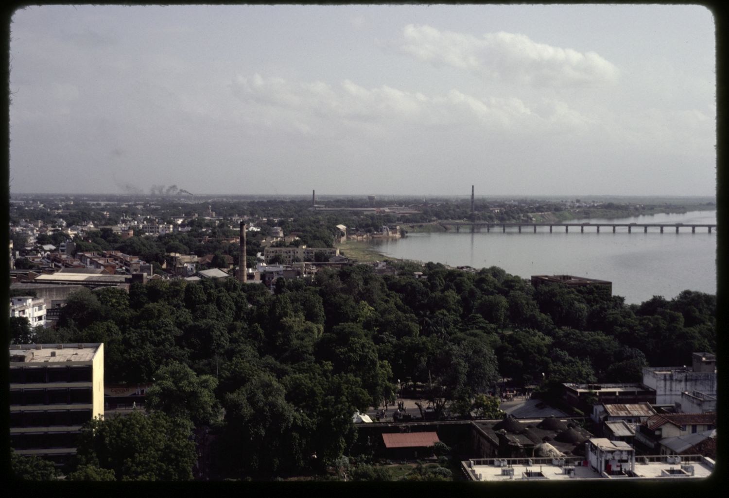 General view over suburbs. The Sabarmati River is visible at right.
